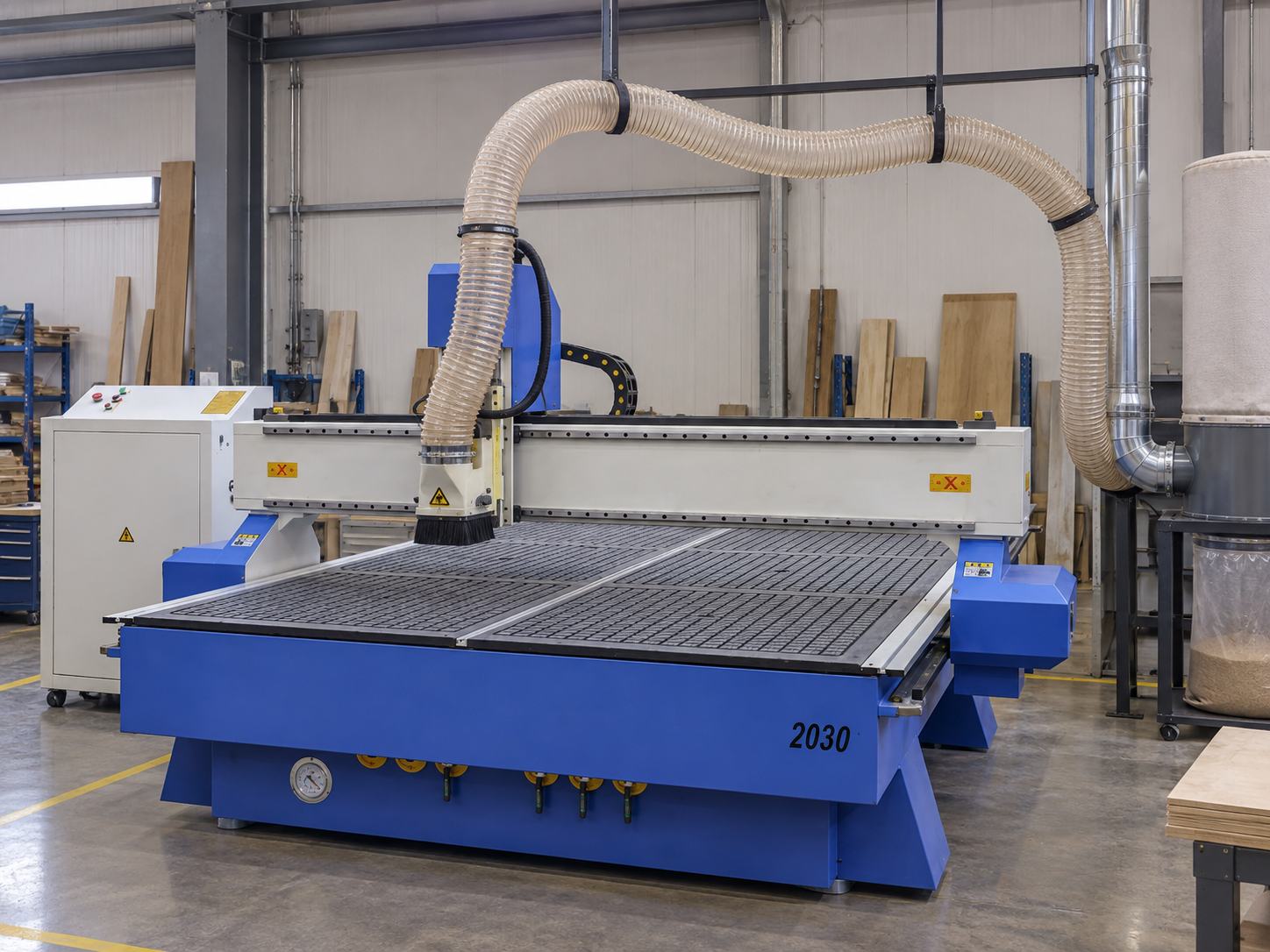 PS-2030 CNC router with flexible dust extraction hose and collector ducting